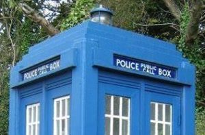 Blue Police Call Box on Earth pavement